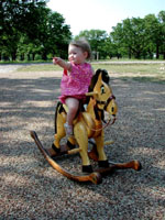17 Month Old Riding the Pony - she can get on all by herself!